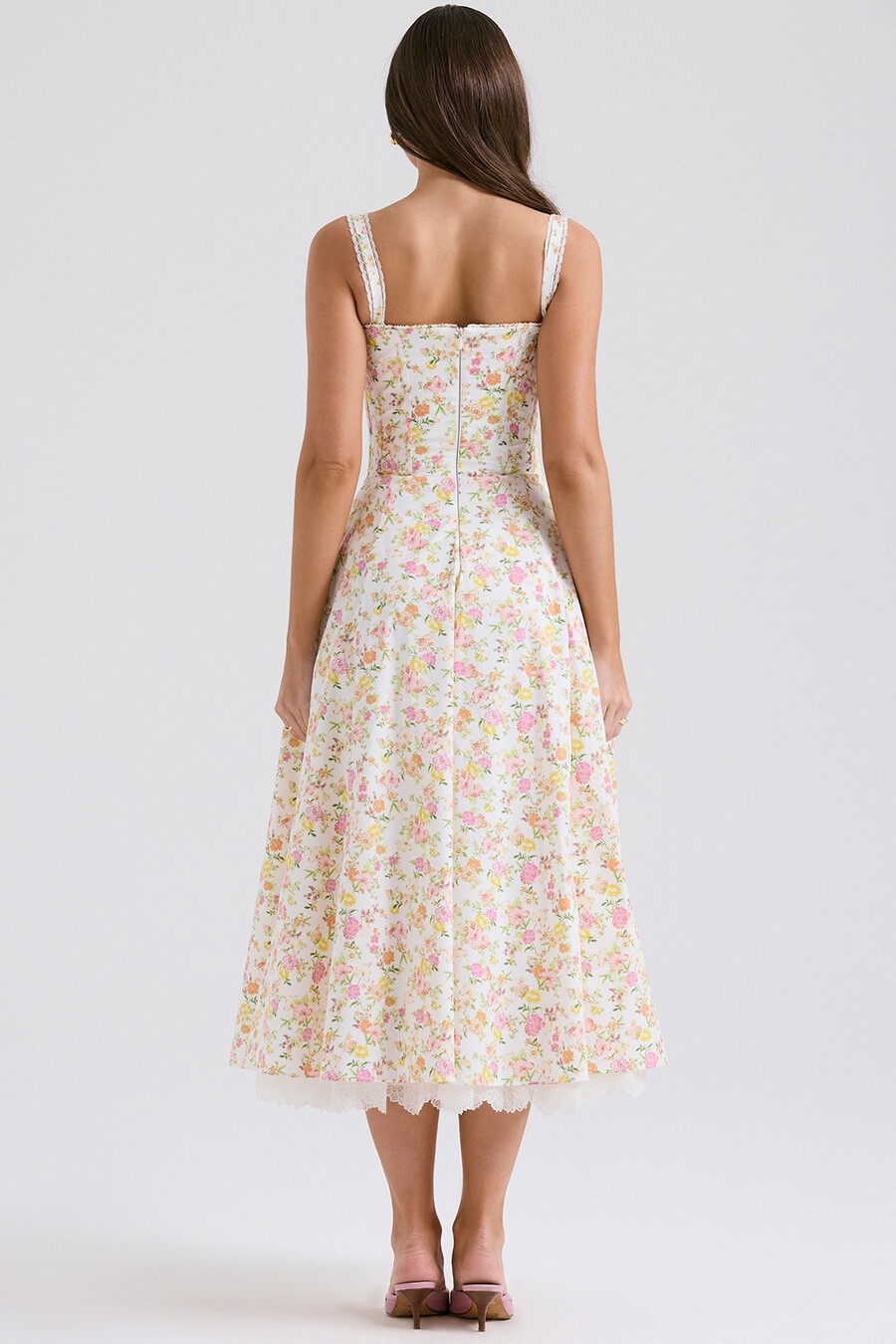 sommerkleid aus elfenbeinfarbenem baumwollbustier mit wiesenmuster