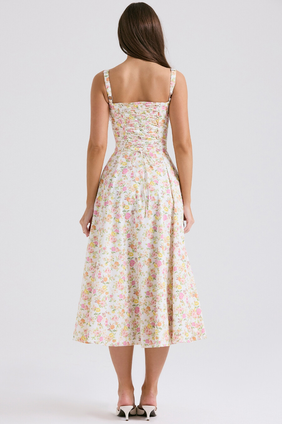 sommerkleid aus elfenbeinfarbenem baumwollbustier mit wiesenmuster